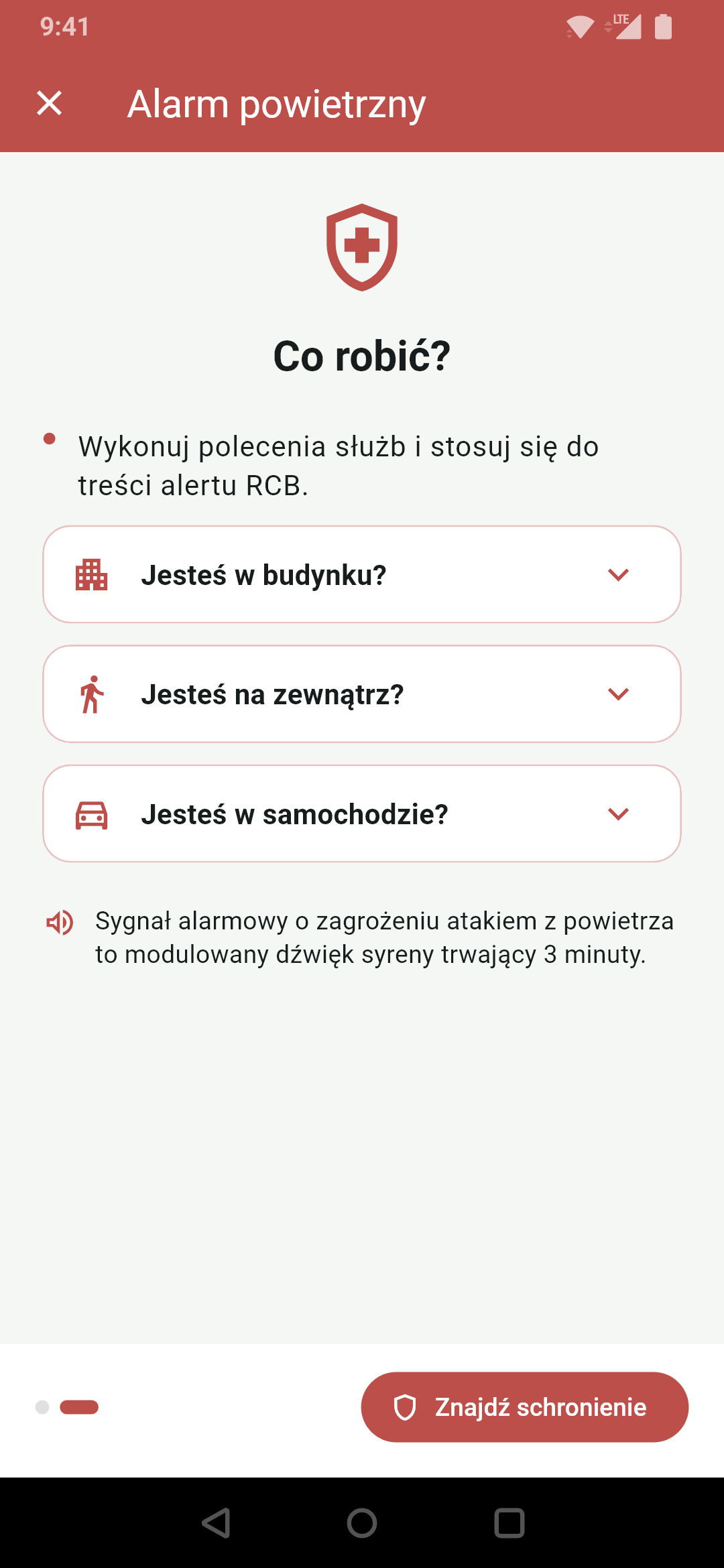 Ekran Alarm powietrzny na najwyższym poziomie zagrożenia w aplikacji Gdzie Schron: co robić w budynku, na zewnątrz i w samochodzie oraz przycisk Znajdź schronienie